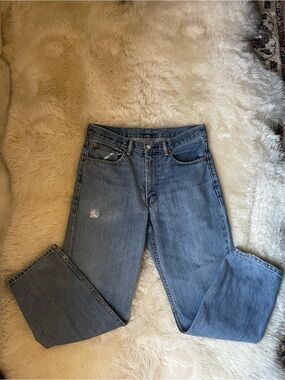 Vintage Levi's 550 mid rise baggy straight leg distressed jeans